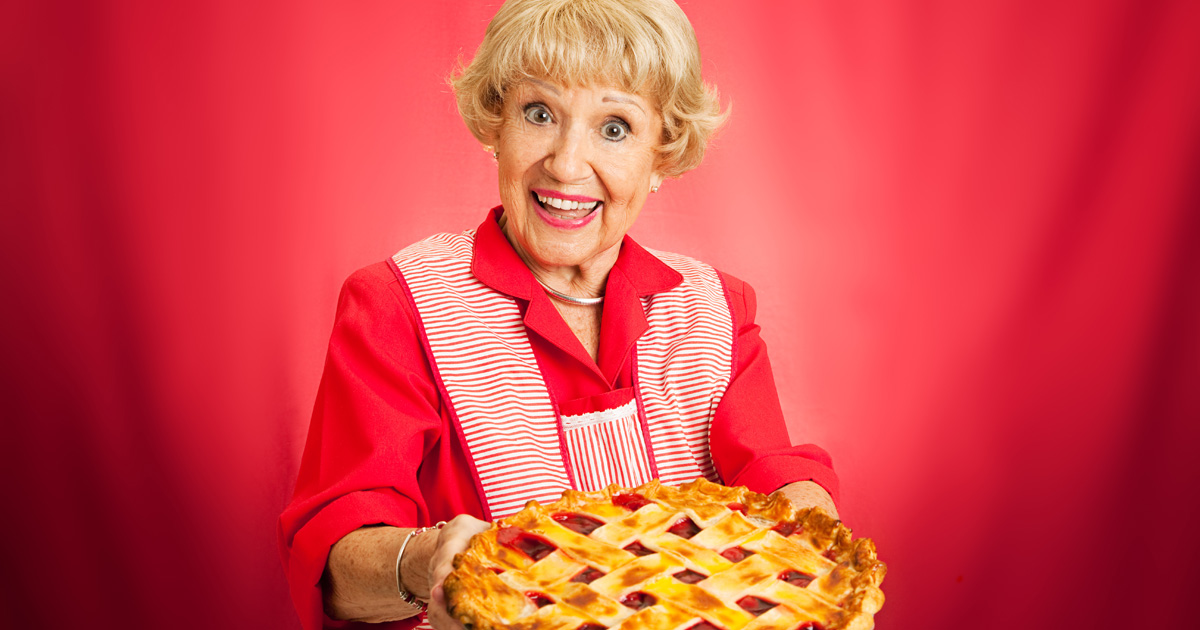 Friendly woman holding a pie. 7 Easy Tips to Deal with “Friendly” Food Pushers